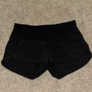 Lululemon black speed up shorts. Size 4